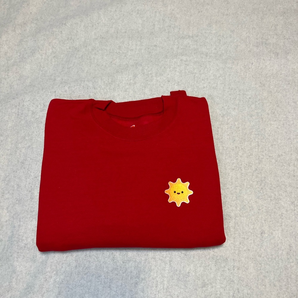 Red Sweatshirt with Sunshine 🌞 emoji